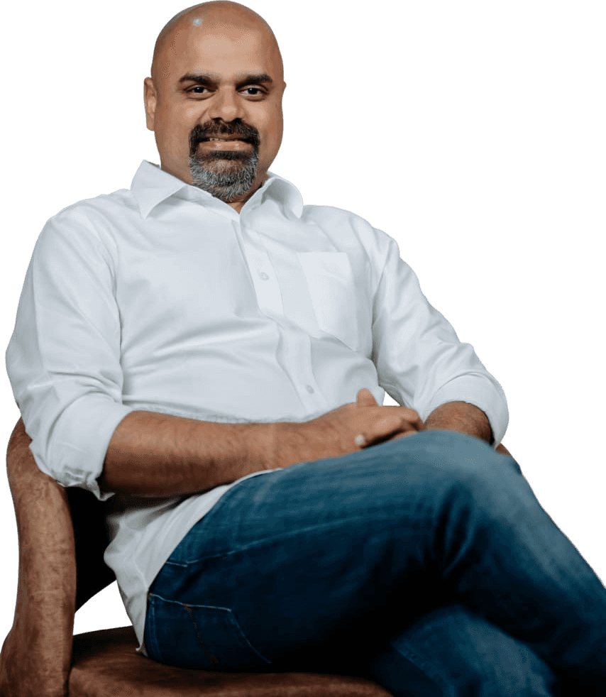 Mani Maran Ramalingam, founder of TheDIco, seated and smiling