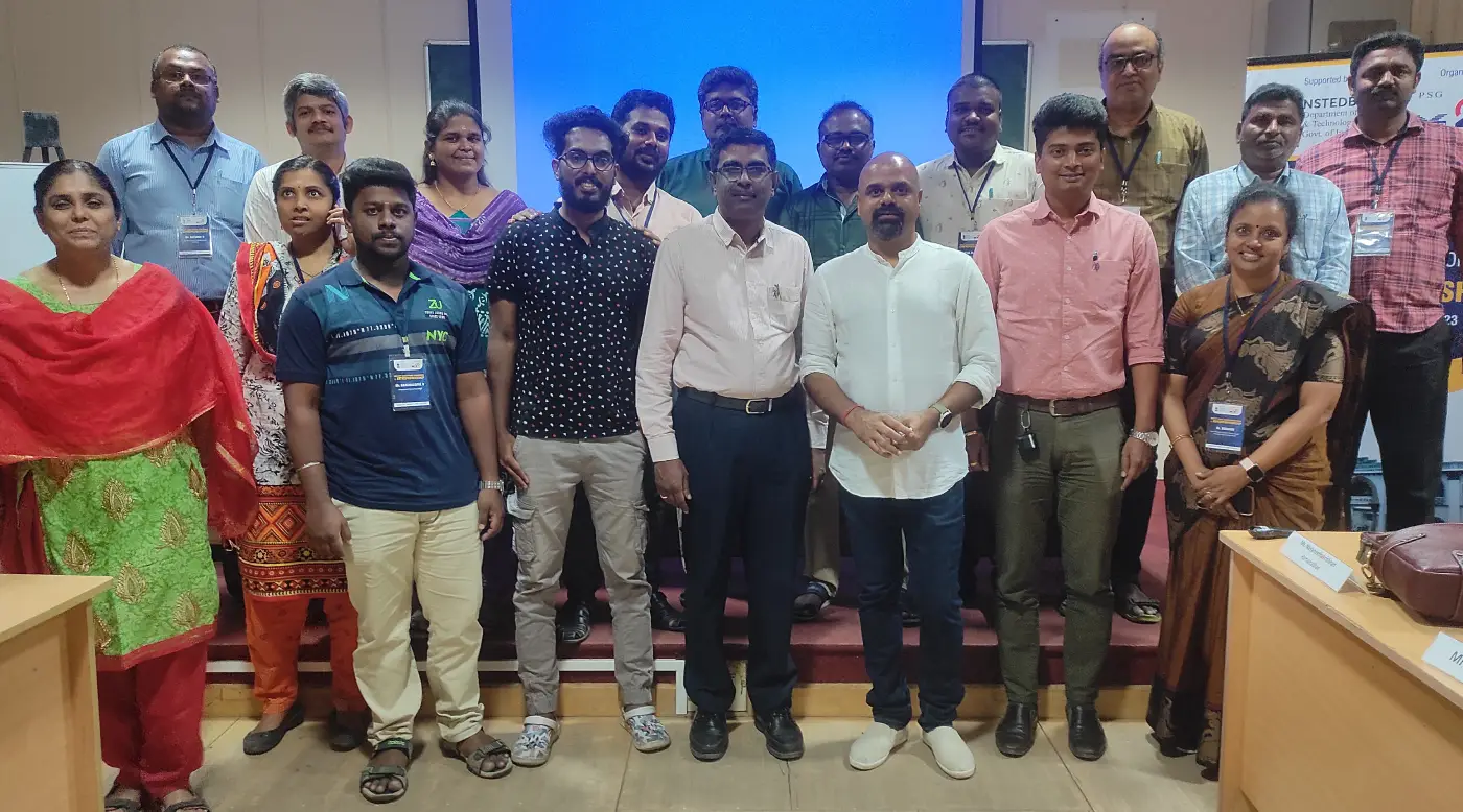 Maran with a cohort of around sixteen participants at the end of a training session